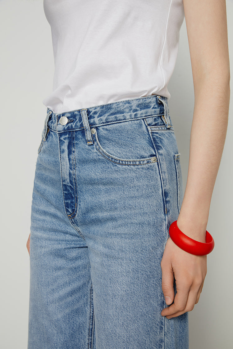 Hey Joanie Coney Island Whitefish high-rise wide-leg jeans with a relaxed fit and light wash denim, shown on a model.