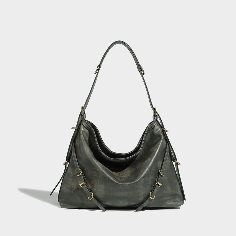 In Orderly Fashion designer shoulder handbag with stylish leather design and adjustable strap, shown on a neutral background.