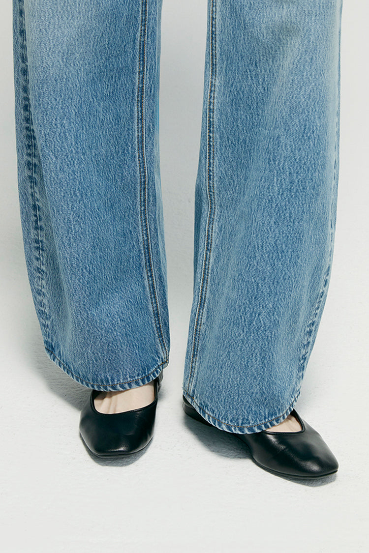 Hey Joanie Slope Curve Jeans in light wash denim, front view showing high waist and classic five-pocket design.
