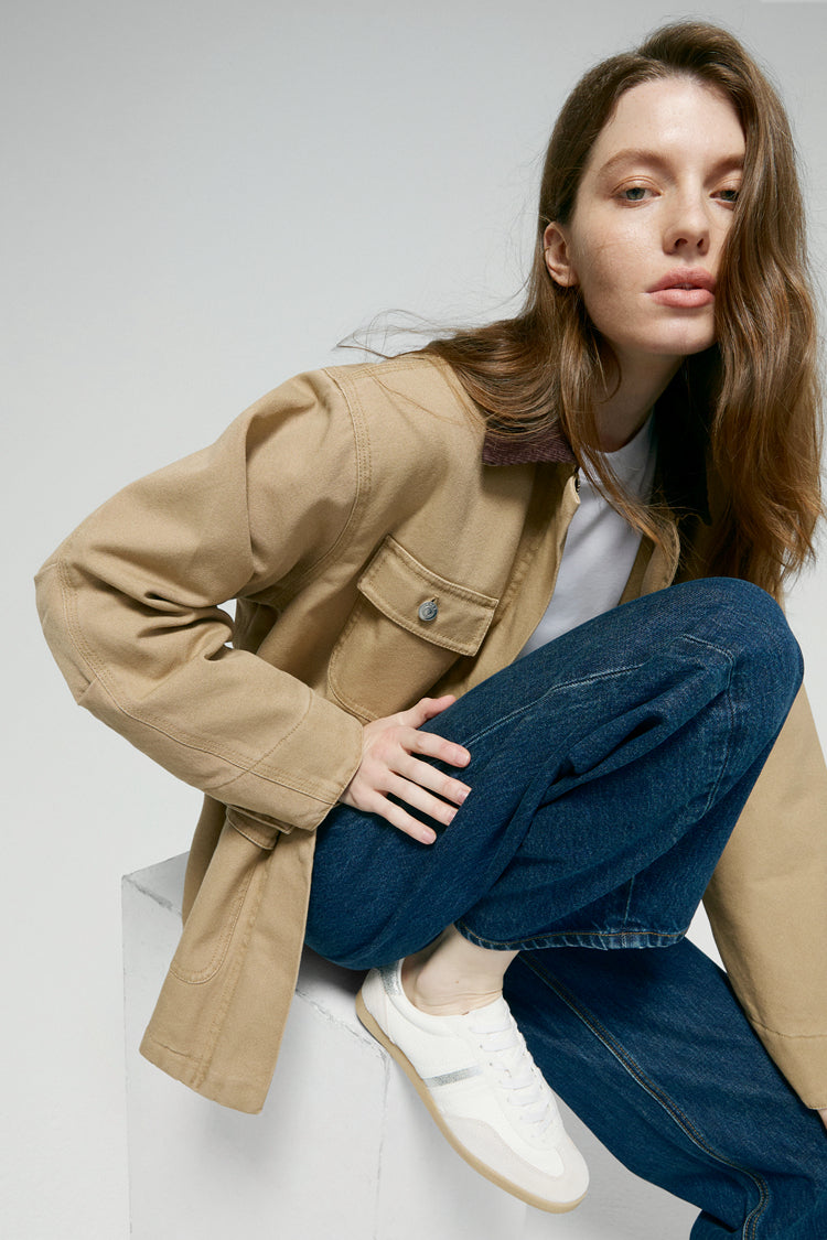 Hey Joanie Slope Curve Jeans in denim, featuring a high-rise fit and classic five-pocket style, shown on a model.