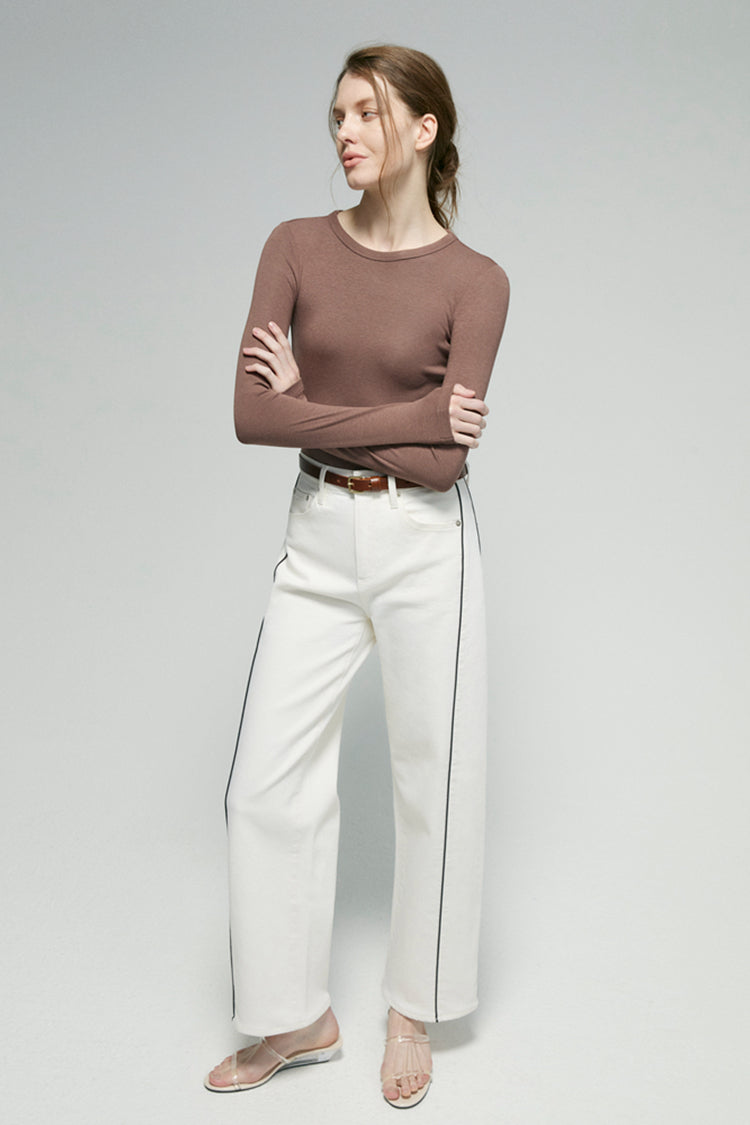 Hey Joanie Crush Curve ankle jeans in denim, fitted with a high waist and casual style, shown in a close-up shot.