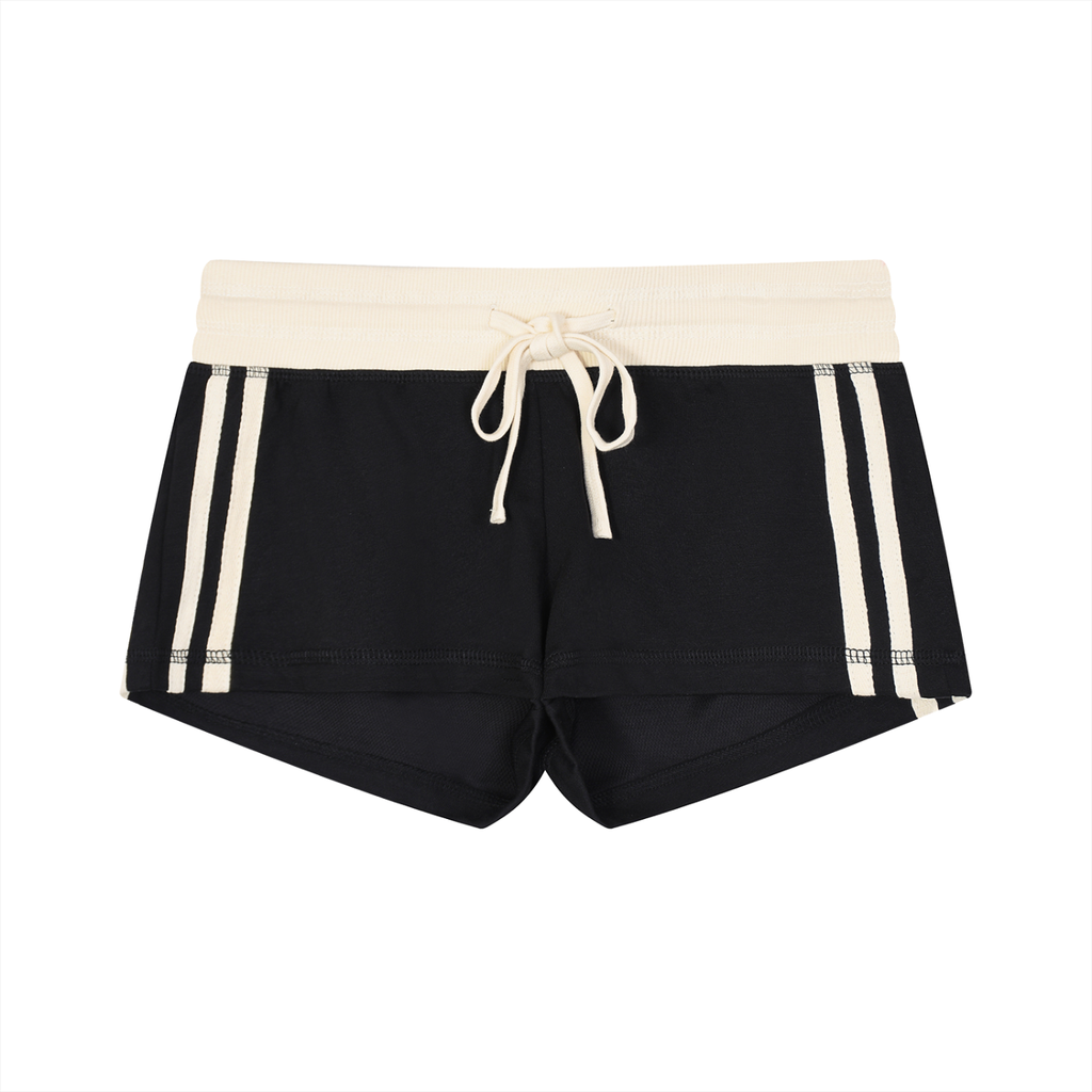 ODMPOD contrast stripe track shorts with black and white design, featuring sporty side stripe detail and comfortable elastic waistband.
