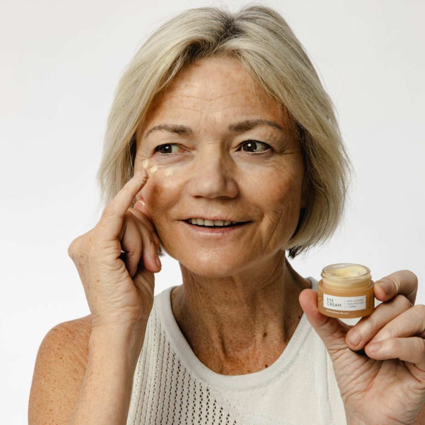 UpCircle anti-aging skincare bundle with cleansers, serums, and moisturizers arranged in a natural setting.