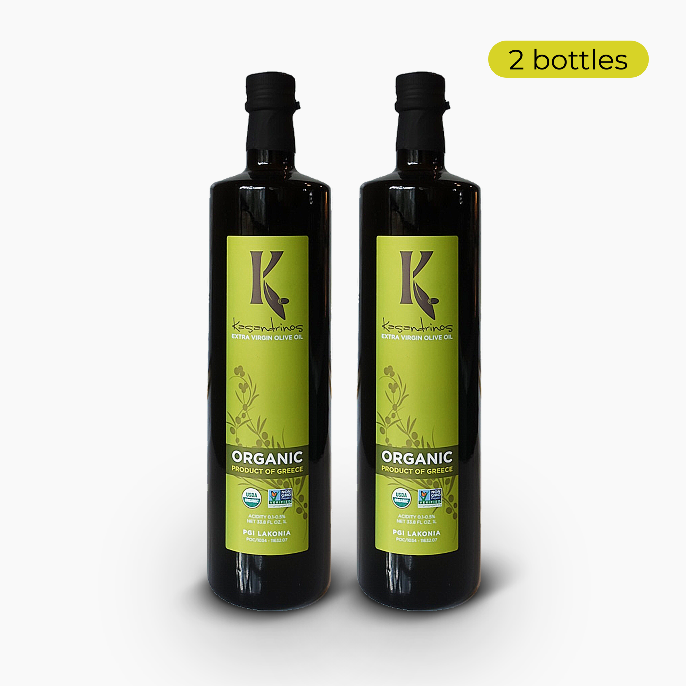 Two 1-liter bottles of Kasandrinos International organic extra virgin olive oil with olive green caps and labels, side by side.
