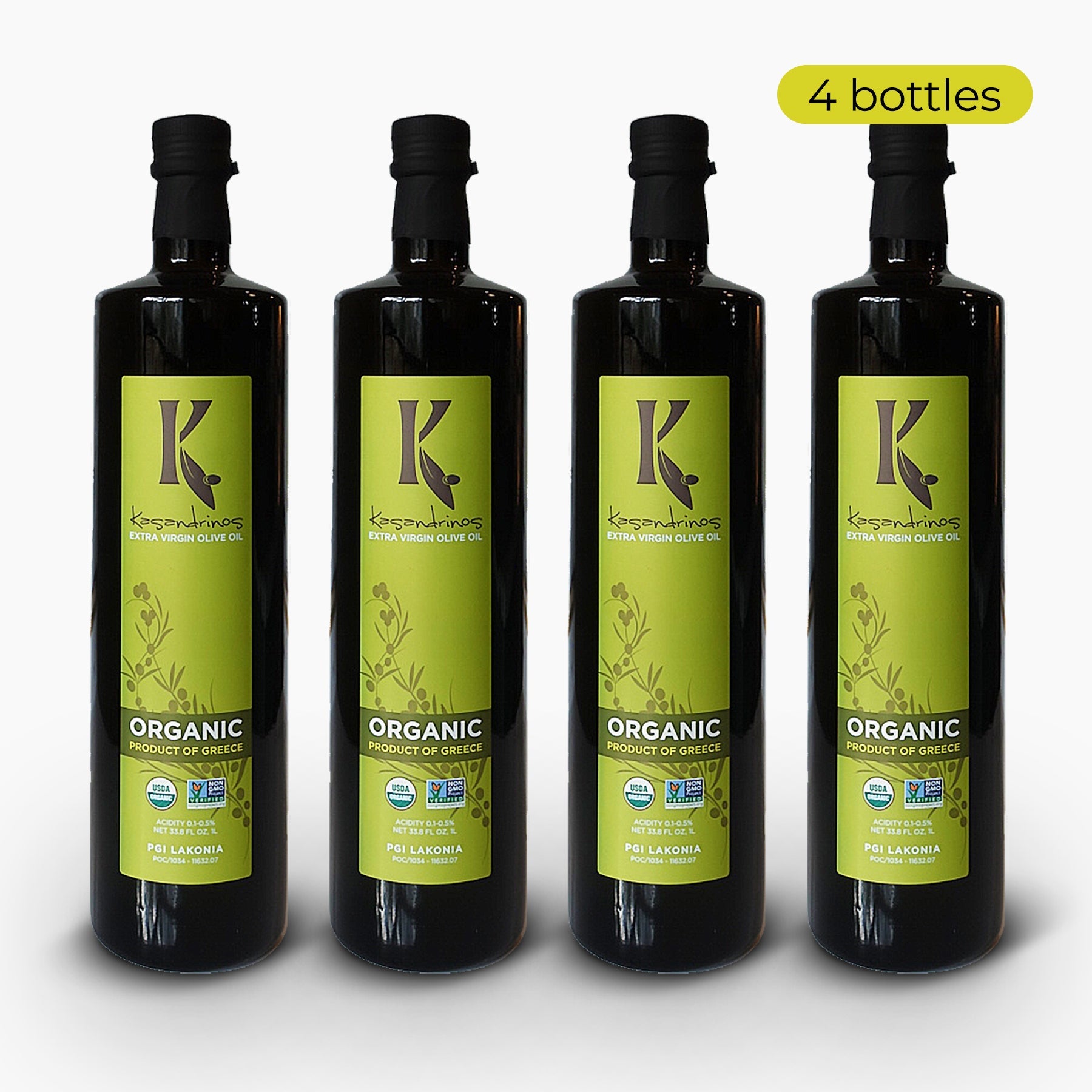 Four 1-liter bottles of Kasandrinos International organic extra virgin olive oil in sleek dark glass bottles.