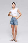 Hey Joanie Easy Buckle Shorts in lightweight fabric with a relaxed fit and adjustable buckle waistband, shown in a casual outdoor setting.