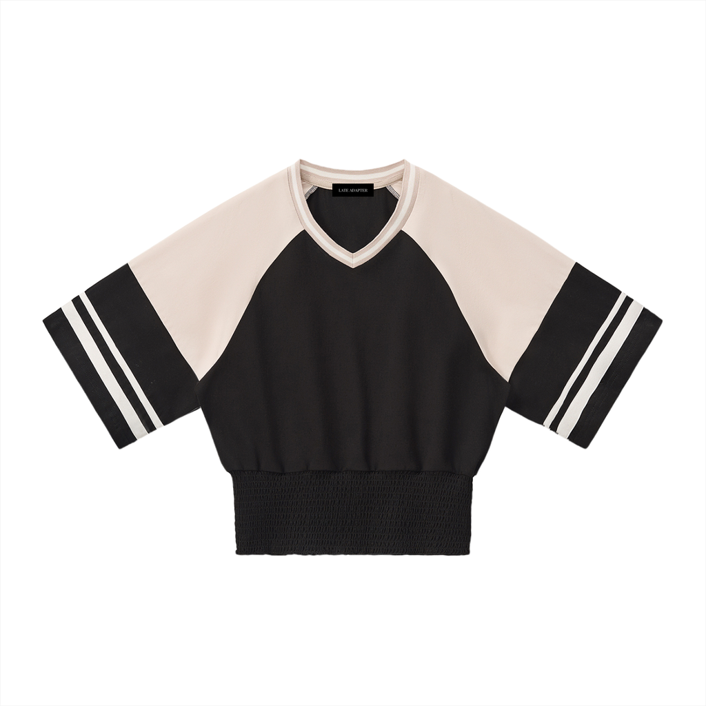 Color block ruched T-shirt by ODMPOD featuring vibrant color panels and ruched detail on soft fabric.