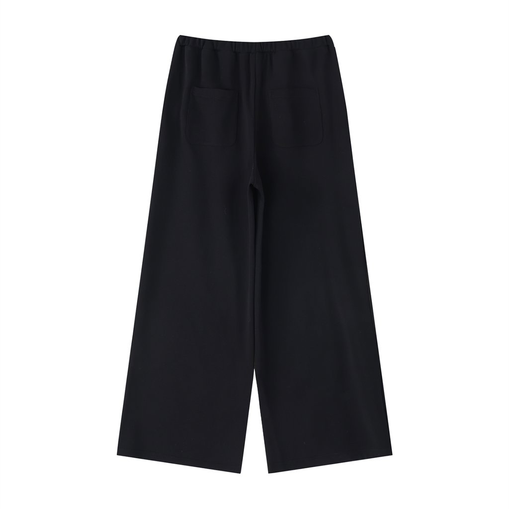 ODMPOD wide leg sweatpants shown in soft fabric, featuring a relaxed fit and elastic waistband for comfort and casual style.