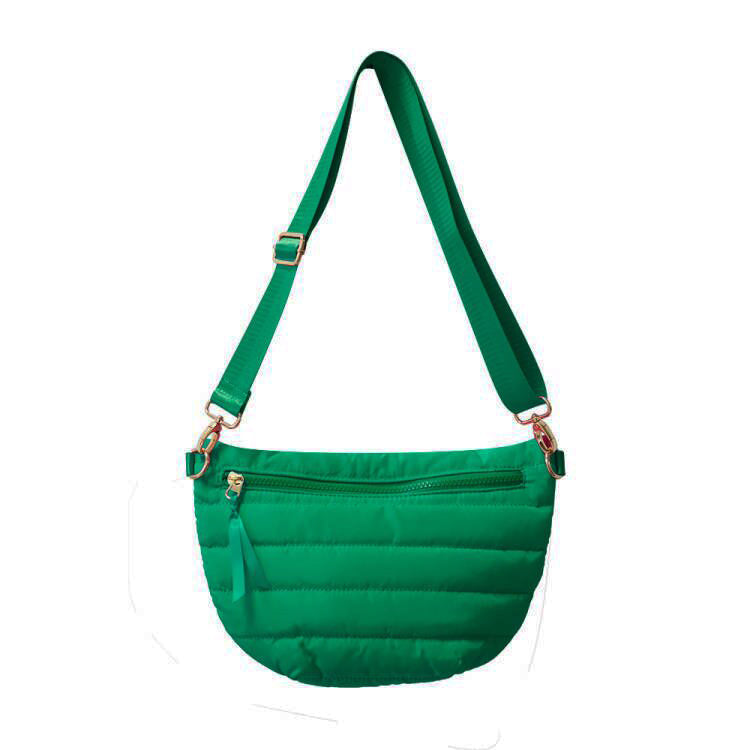 Babs+Birdie Crescent Puffer Sling Bag with quilted design and adjustable strap, stylish and functional for everyday use.
