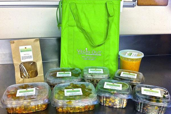 Vegin' Out vegetarian and vegan meal delivery box with colorful, fresh plant-based meals ready for weekly delivery.