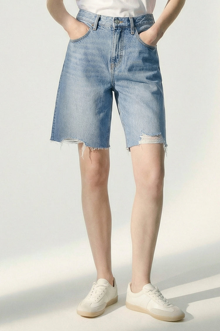 Hey Joanie Coastal Breeze 90's Bermuda Shorts in light blue denim with rolled cuffs, casual summer style, front pockets, and relaxed fit.
