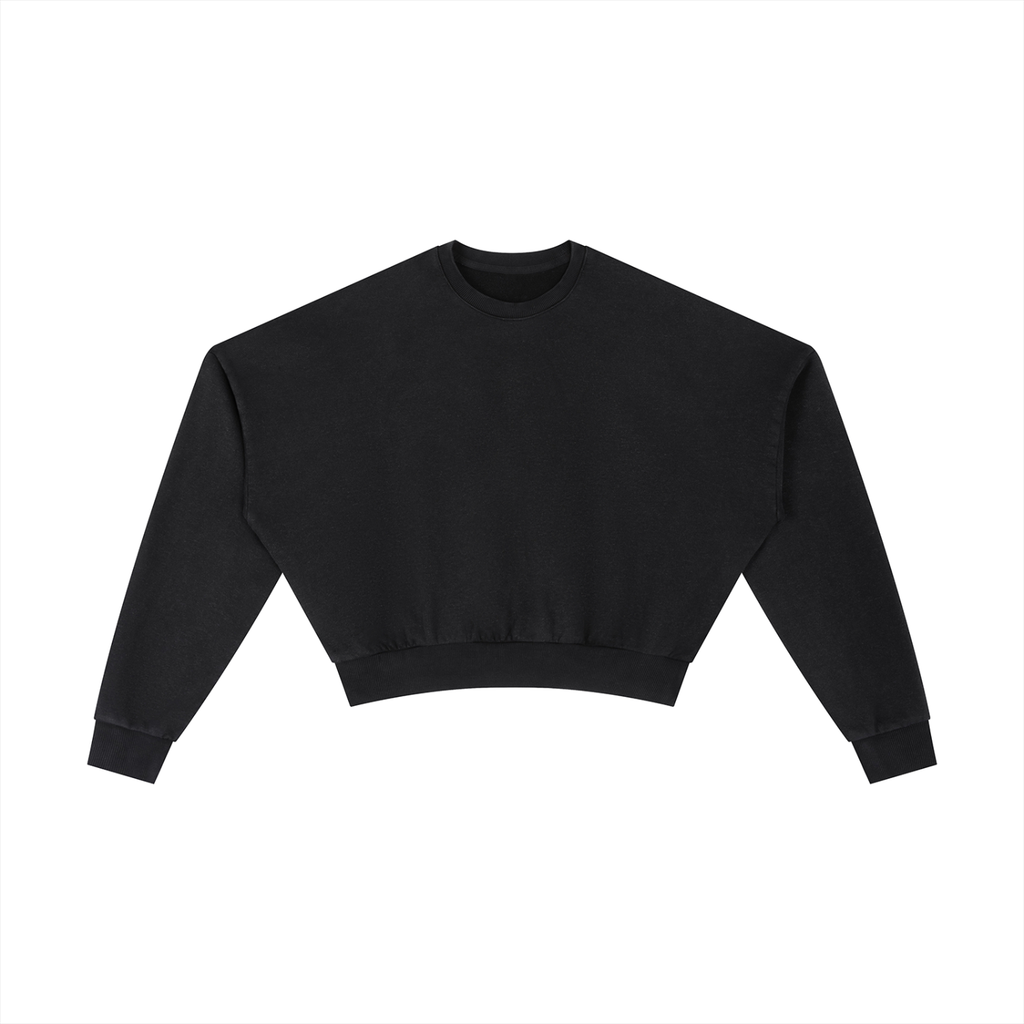 ODMPOD vintage washed cropped sweatshirt featuring a relaxed fit and distressed fabric in a casual, stylish design.