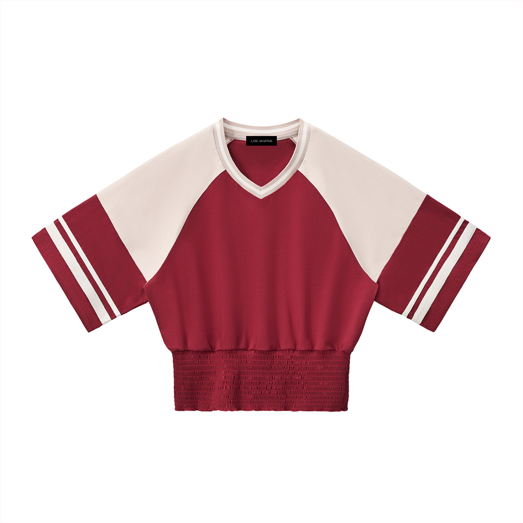 Color block ruched T-shirt by ODMPOD featuring mixed vibrant colors and a fitted, ruched design on soft fabric.