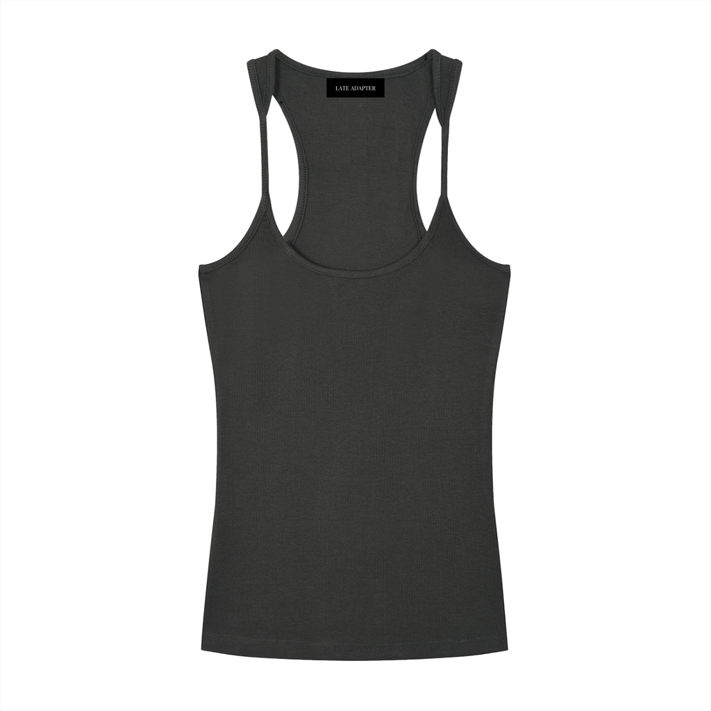Slim fit ribbed racerback tank top by ODMPOD, showing a close-up of the fitted, textured fabric and racerback design.