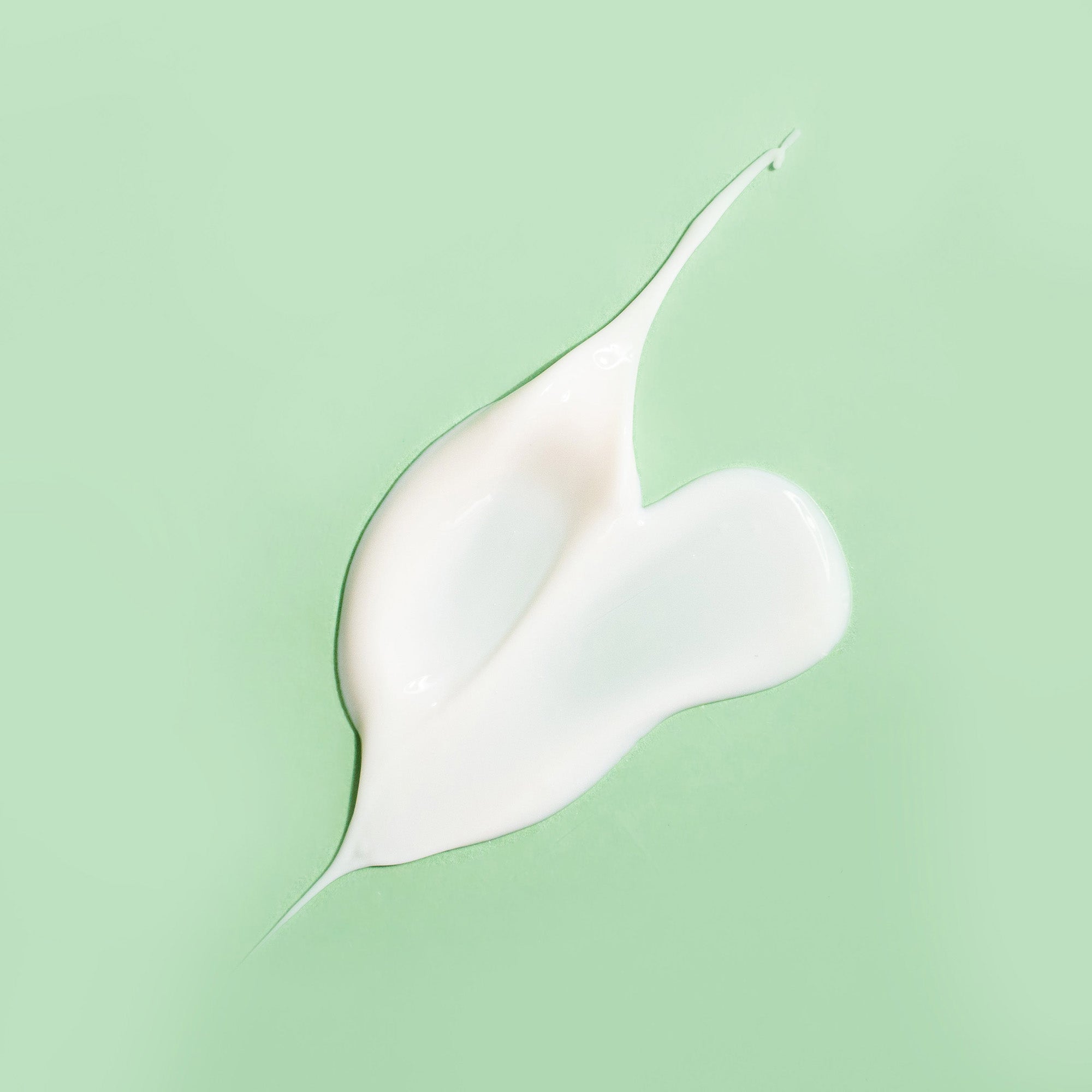 Somme Institute A-Bomb Moisturizer in a 2-ounce jar, creamy texture, designed for hydrating and nourishing skin.