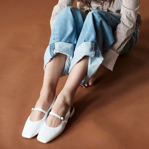 Amie Rafa Athena Mary Jane flats showing black leather shoes with rounded toe and ankle strap on a plain background.