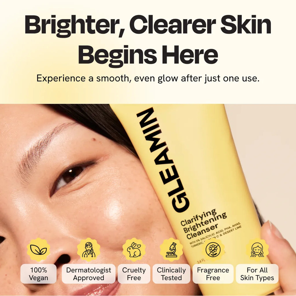 Gleamin Clarifying Brightening Facial Cleanser with a clear pump bottle and white creamy cleanser inside.
