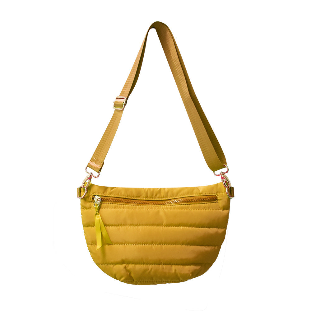 Babs+Birdie Crescent Puffer Sling Bag in quilted design with adjustable strap and front pocket, black color.