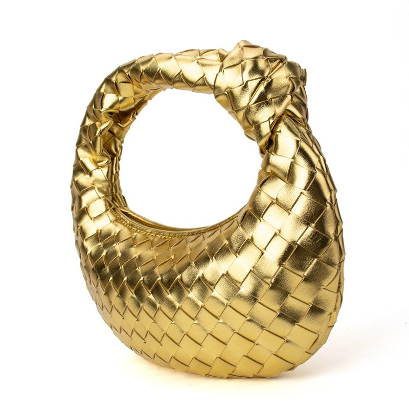 Gold knotted woven handbag by Babs+Birdie, The Charlize, featuring a stylish handmade design and woven texture.