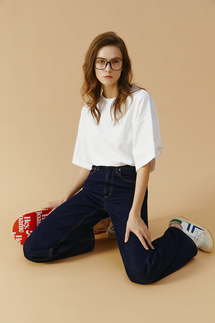 Hey Joanie Coney Island Whitefish high-rise wide jeans with a relaxed fit and classic denim wash, shown on a model.