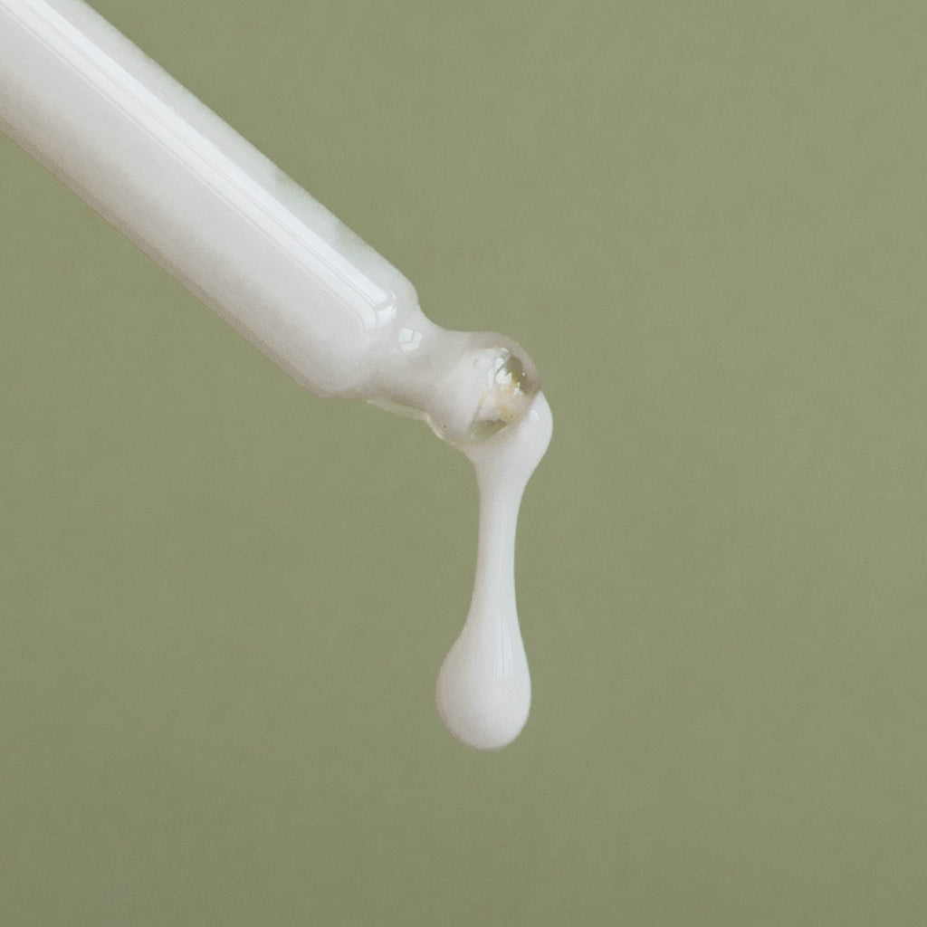 IDEA Skincare Skin Memory Serum in a sleek glass bottle, featuring a dropper applicator and clear labeling on a white background.