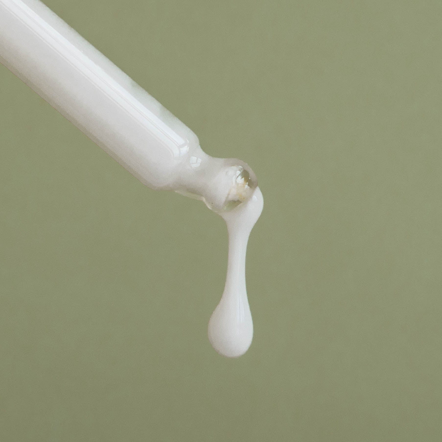 IDEA Skincare Skin Memory Serum in a sleek glass bottle, featuring a dropper applicator and clear labeling on a white background.