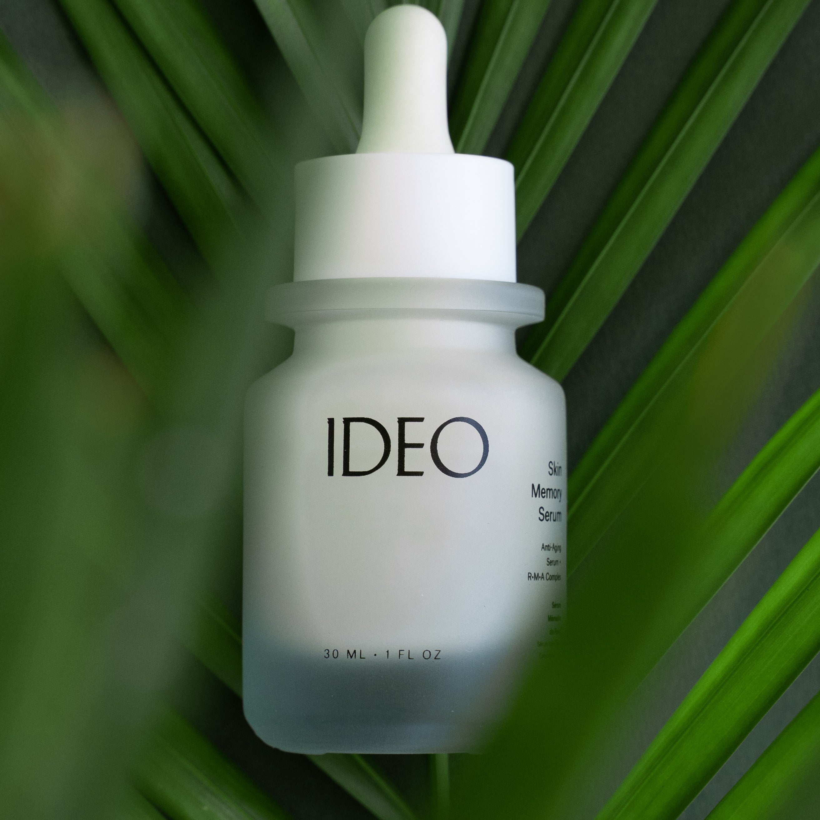 IDEA Skincare Skin Memory Face Serum bottle with sleek packaging and dropper applicator on a white background.