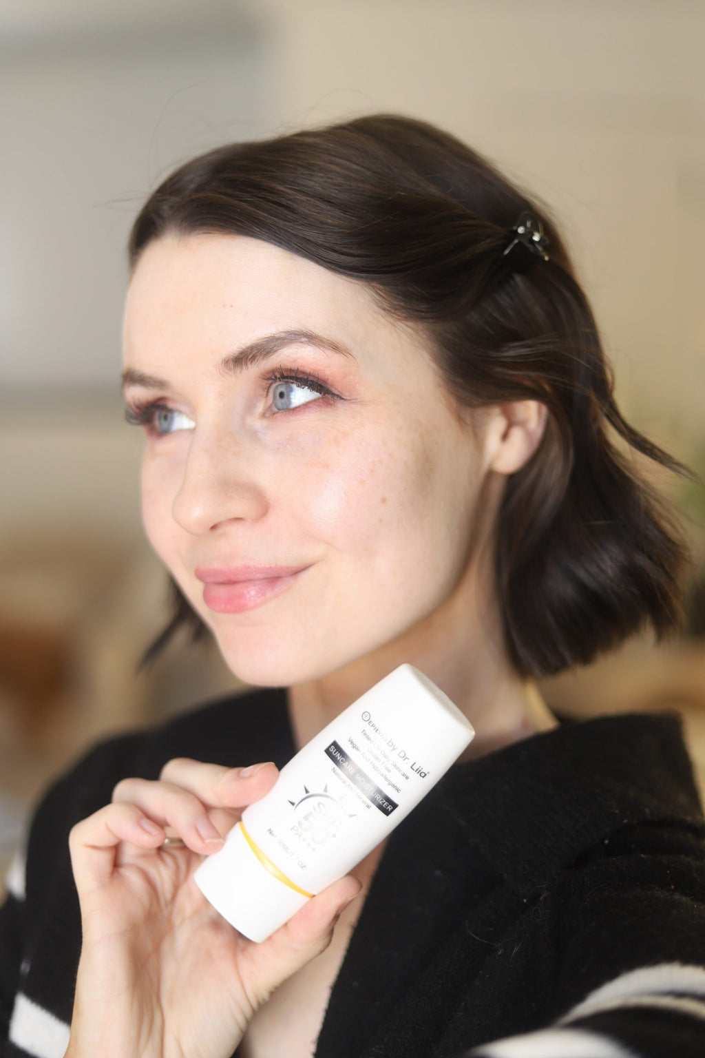 EpiLynx SPF 50 mineral moisturizer in a pump bottle, with a smooth, hydrating formula suitable for sensitive skin.