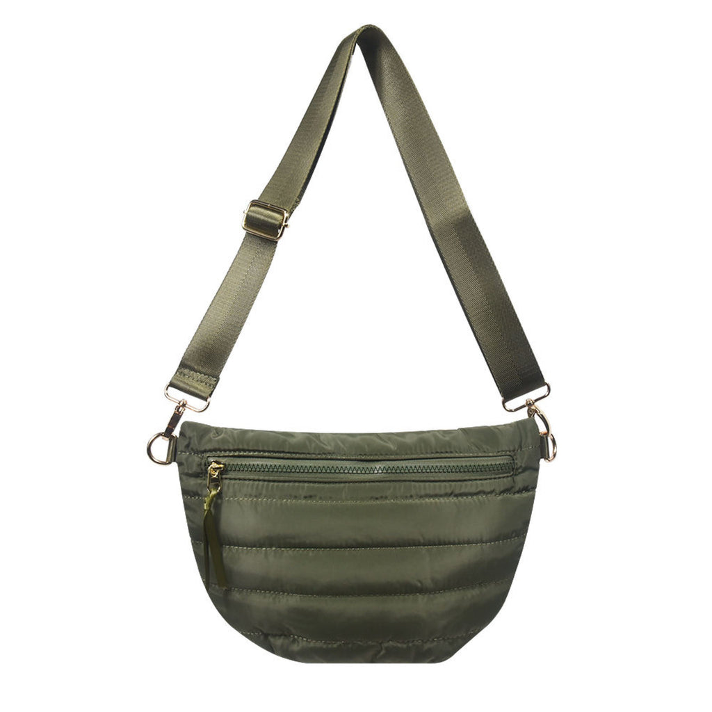 Babs+Birdie Crescent Puffer Sling Bag with quilted design and adjustable strap, stylish accessory for everyday use.