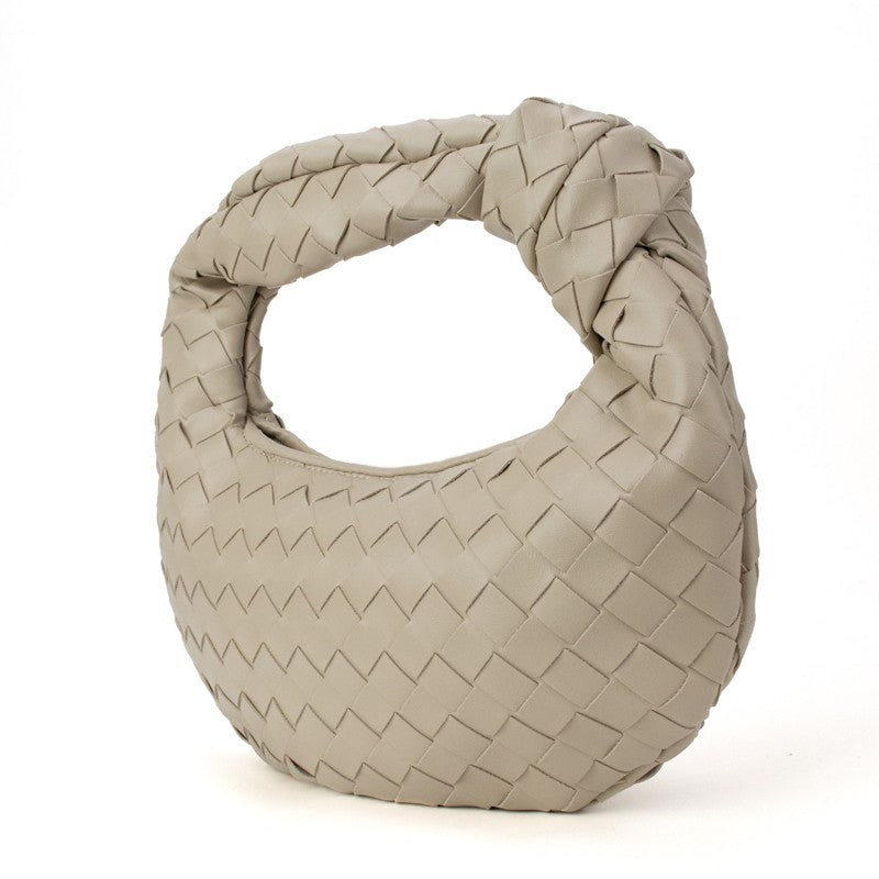 Khaki knotted woven handbag from Babs+Birdie’s The Charlize collection, featuring a stylish handwoven design and compact size.