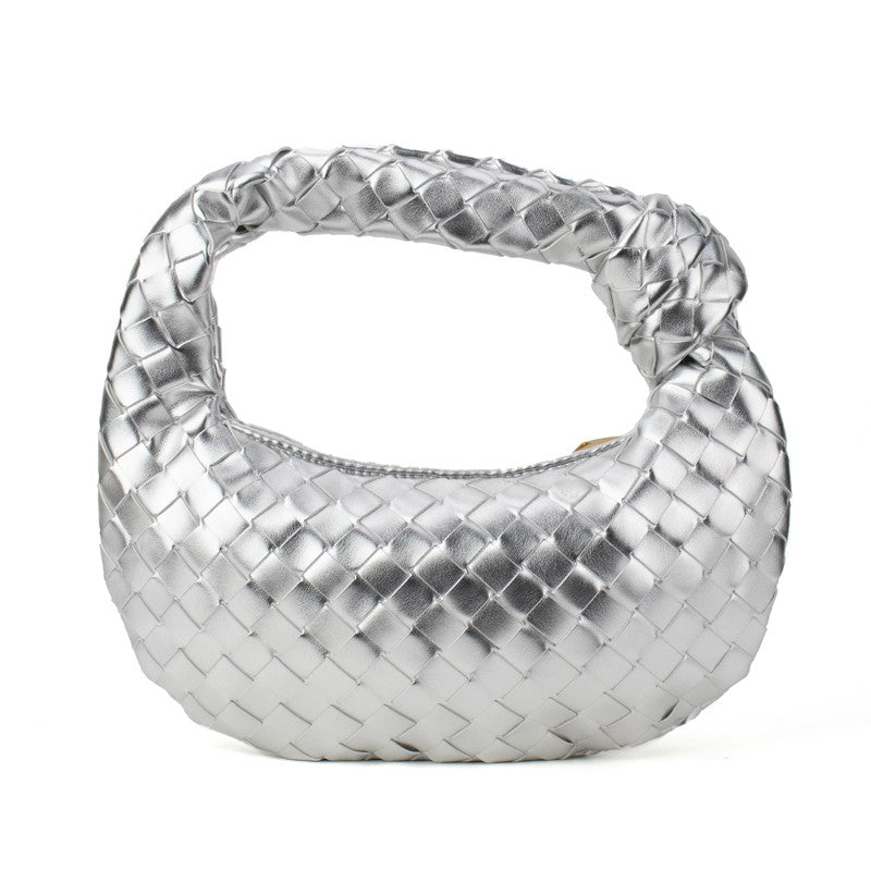 Silver woven knotted handbag from Babs+Birdie’s The Charlize collection, showcasing intricate woven design and stylish handcraft.