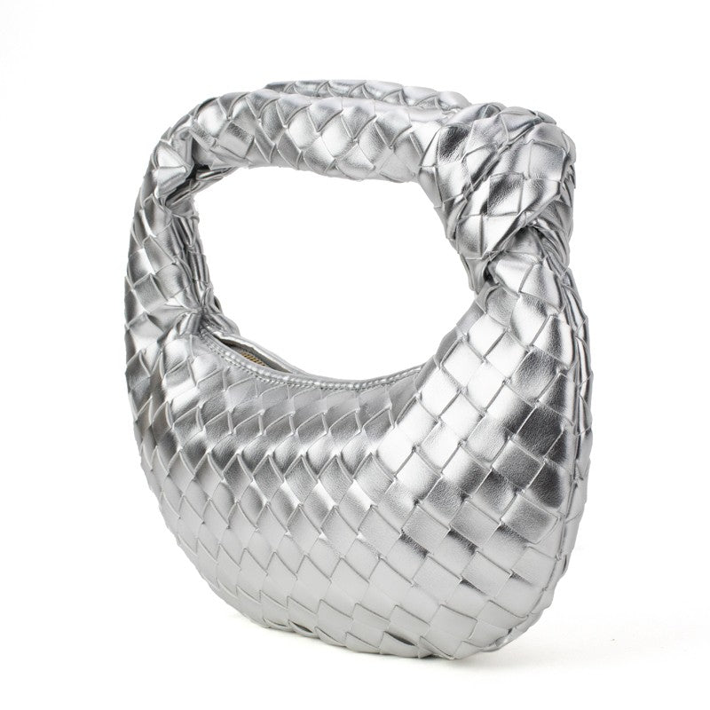 Silver woven knotted handbag by Babs+Birdie, The Charlize, featuring a stylish handwoven design and knotted details.