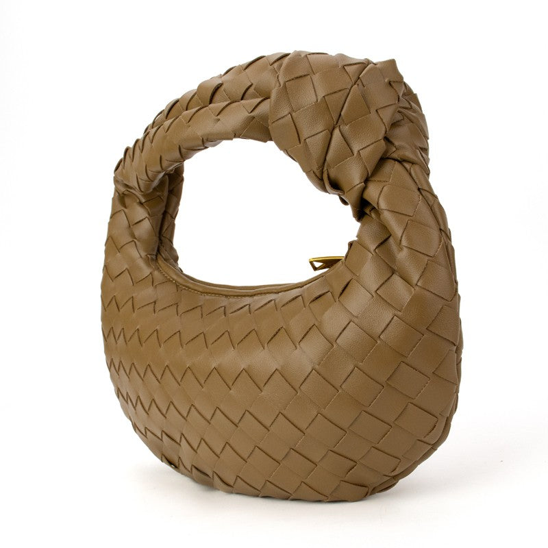 Brown woven knotted handbag from Babs+Birdie’s The Charlize collection, showcasing handcrafted woven texture and stylish knot detail.