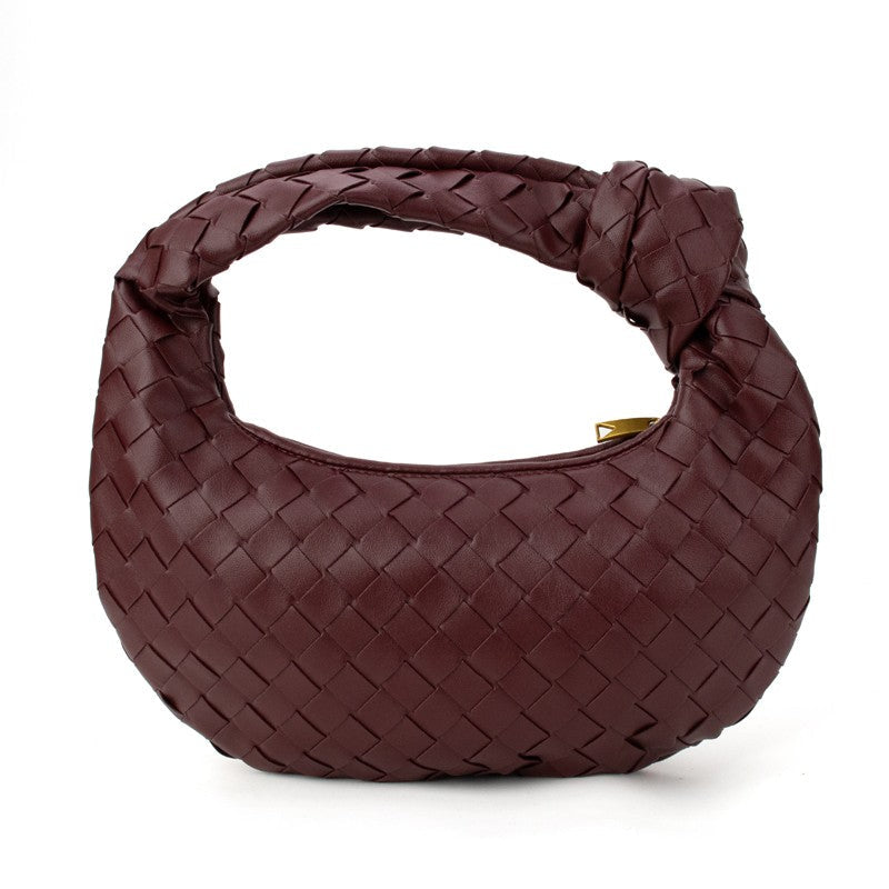 Babs+Birdie The Charlize woven knotted handbag with braided handles and intricate woven pattern, stylish accessory for everyday use.