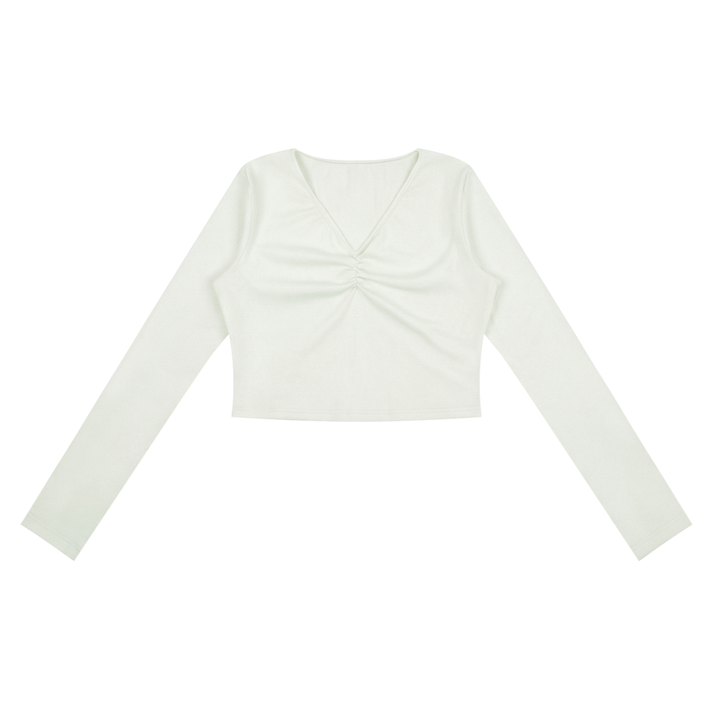 ODMPOD ruched long sleeve crop T-shirt shown in a neutral color, with fitted long sleeves and a stylish ruched design.