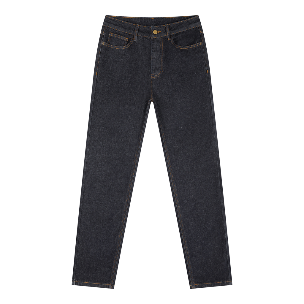 Odmpod high-rise skinny jeans in classic denim, close-up of fit and stitching on a model.