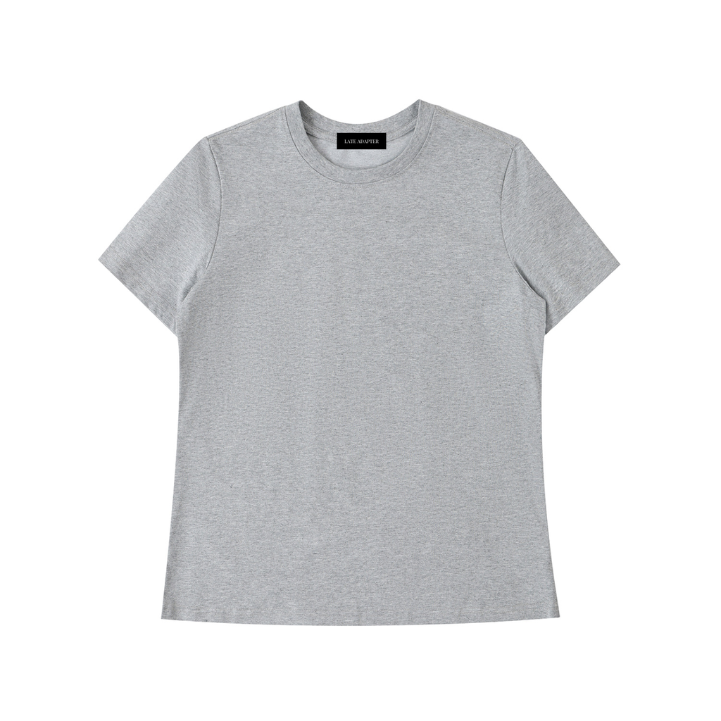 ODMPOD Essential Standard Shoulder T-Shirt in neutral color, featuring a classic fit and short sleeves, casual everyday wear