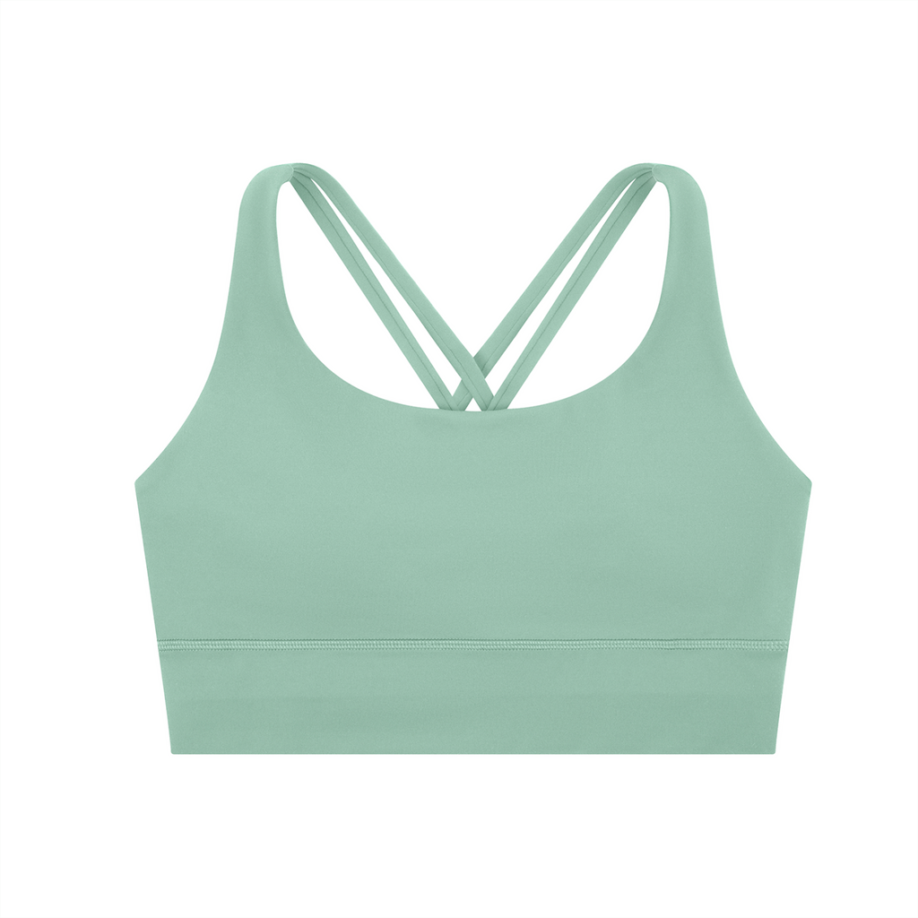 ODMPOD strappy criss-cross sports bra with adjustable straps and breathable fabric, designed for activewear and workout support.