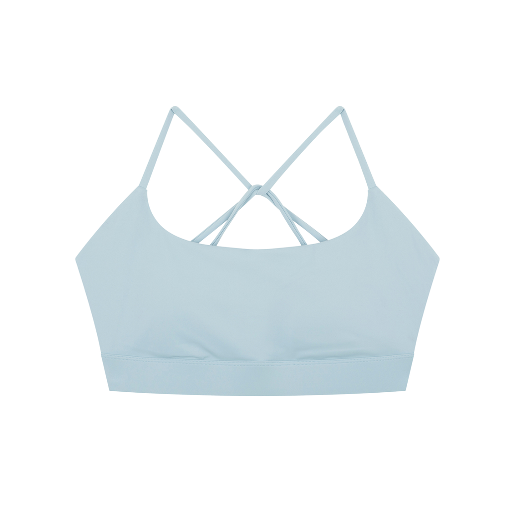 ODMPOD strappy criss cross yoga sports bra with supportive design and adjustable straps for comfortable activewear.