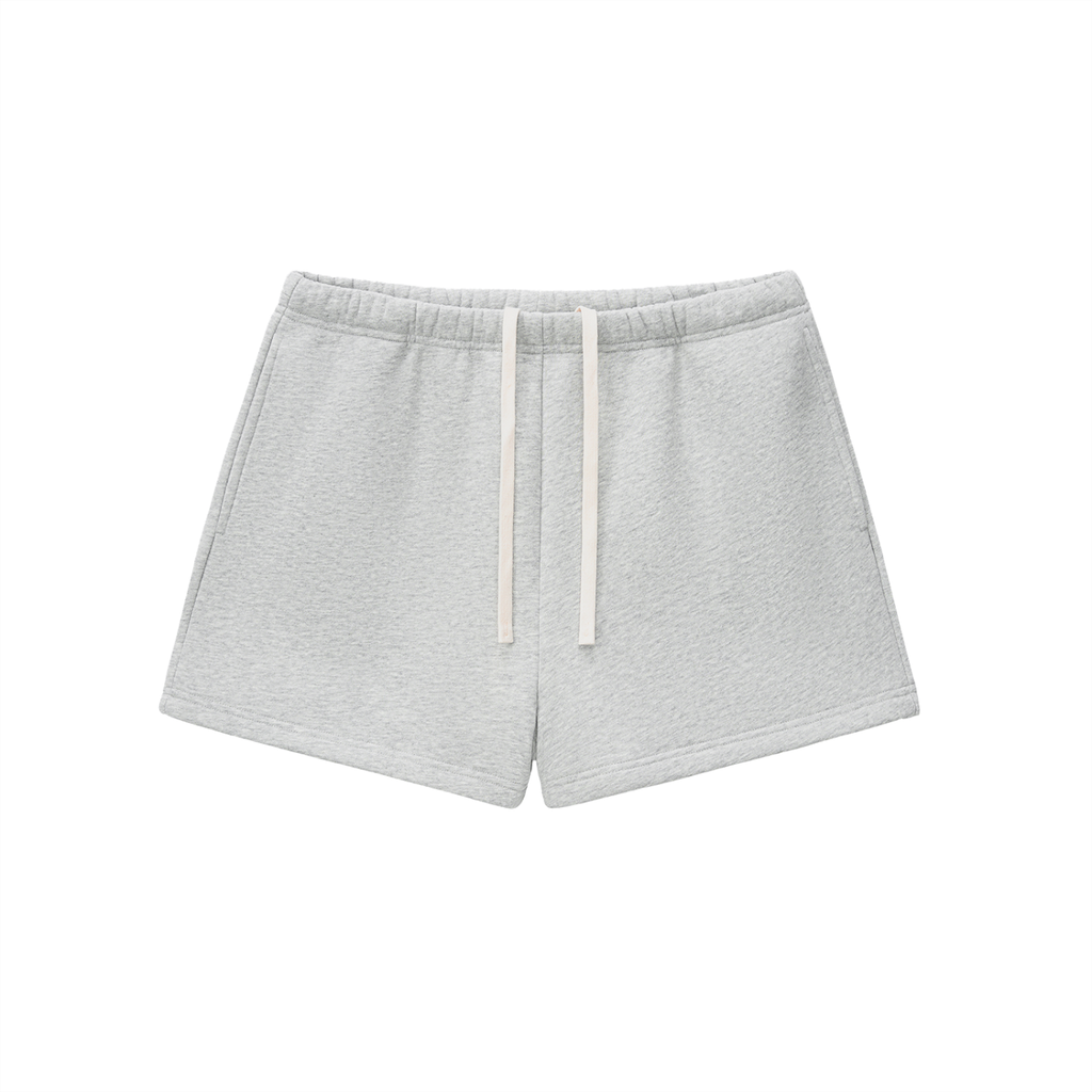 ODMPOD Essential fleece drawstring sweatshorts shown in soft fleece fabric with adjustable waistband and relaxed fit.