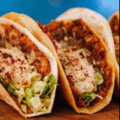 Vegan Fndly Bean Tacos Recipe featuring colorful tacos filled with beans, vegetables, and fresh toppings on a plate.
