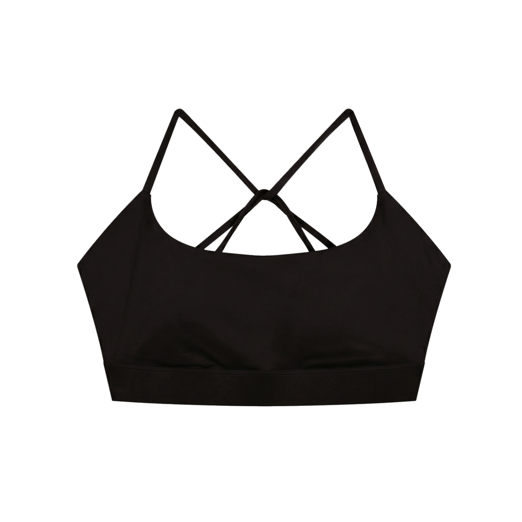 ODMPOD strappy criss cross yoga sports bra with adjustable straps and breathable fabric, designed for active workouts.