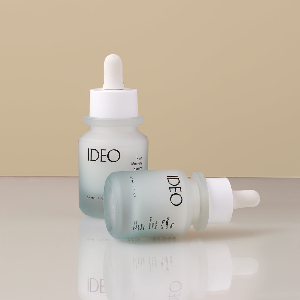 IDEOSkincare Skin Memory Serum in a glass dropper bottle, showcasing the face serum with a sleek, minimalist design.
