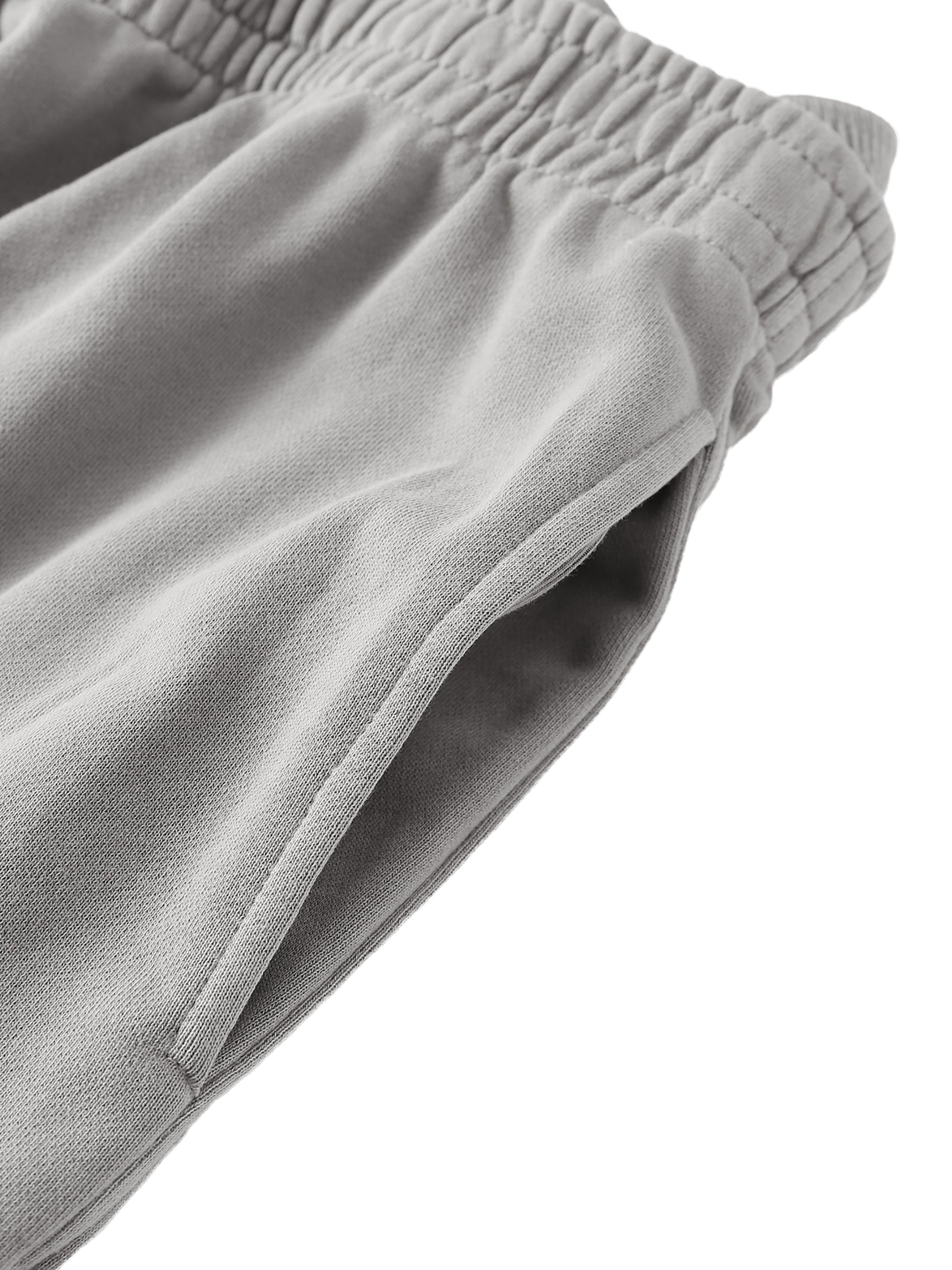 Vintage washed ODMPOD sweatpants with a relaxed fit, shown in a soft, worn-in fabric style.