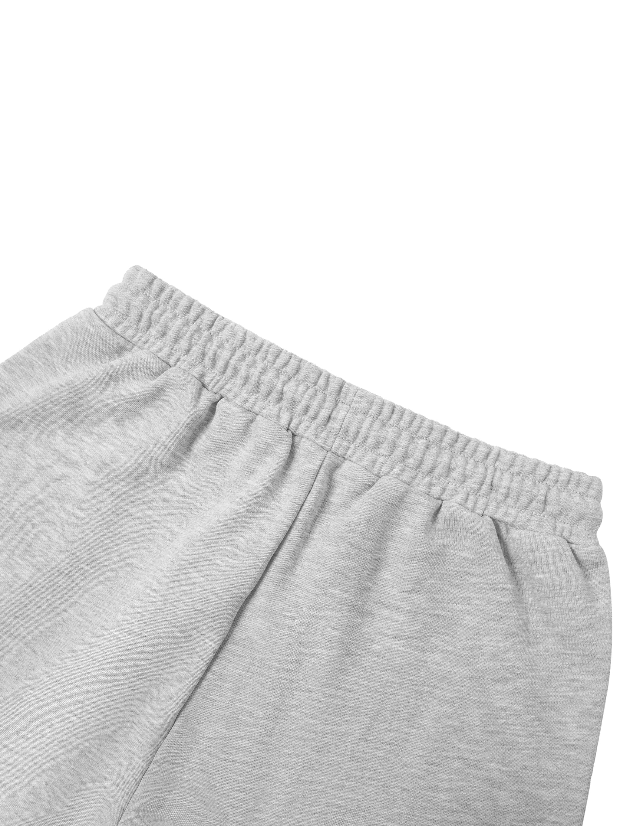ODMPOD essential straight-leg sweatpants shown in soft, comfortable fabric with a relaxed fit and elastic waistband.