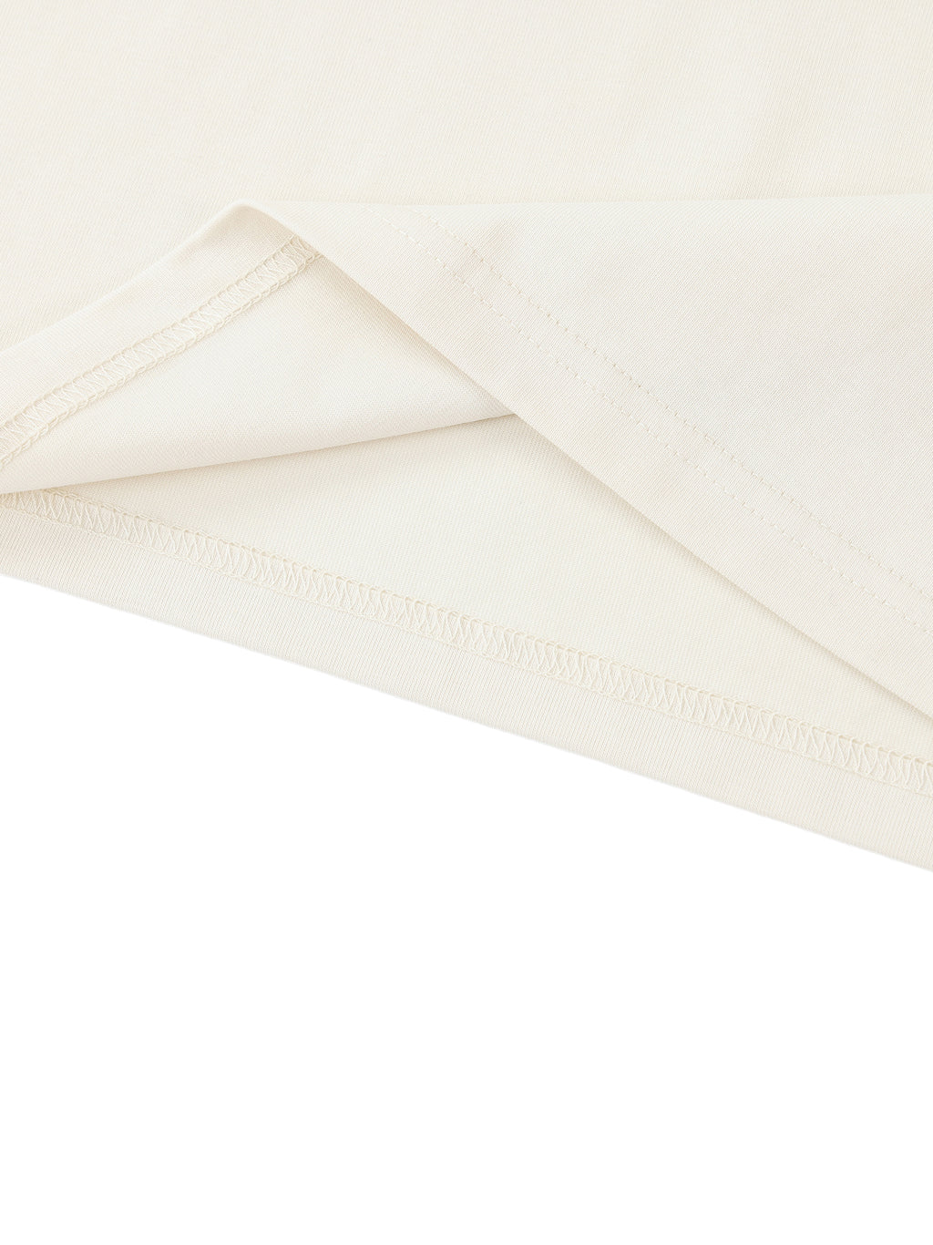 White ODMPOD Essential Standard Shoulder T-Shirt displayed on a model, showcasing its comfortable fit and classic design.