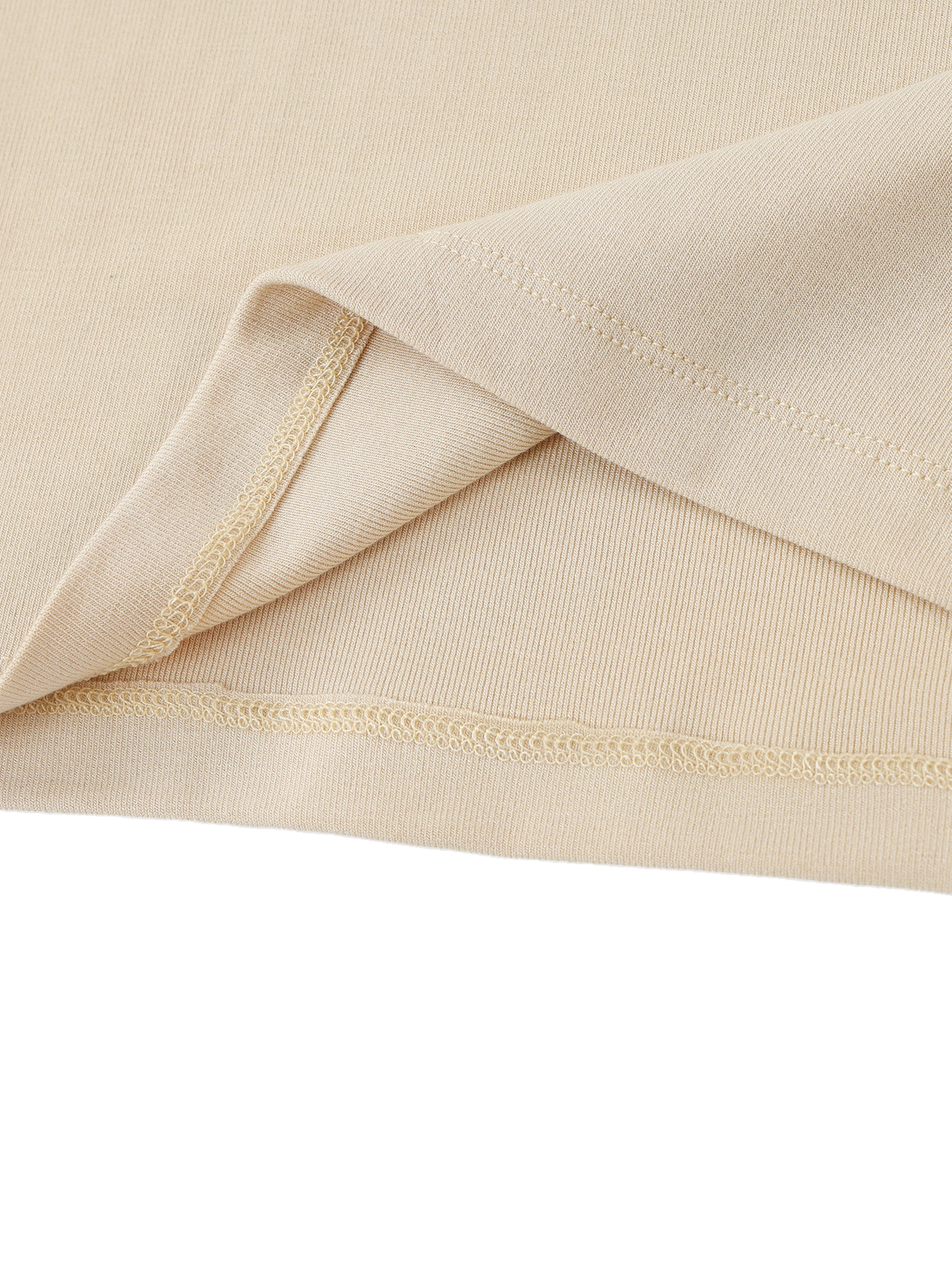 ODMPOD essential mock neck long sleeve T-shirt in white, featuring a fitted design and soft fabric for casual wear.