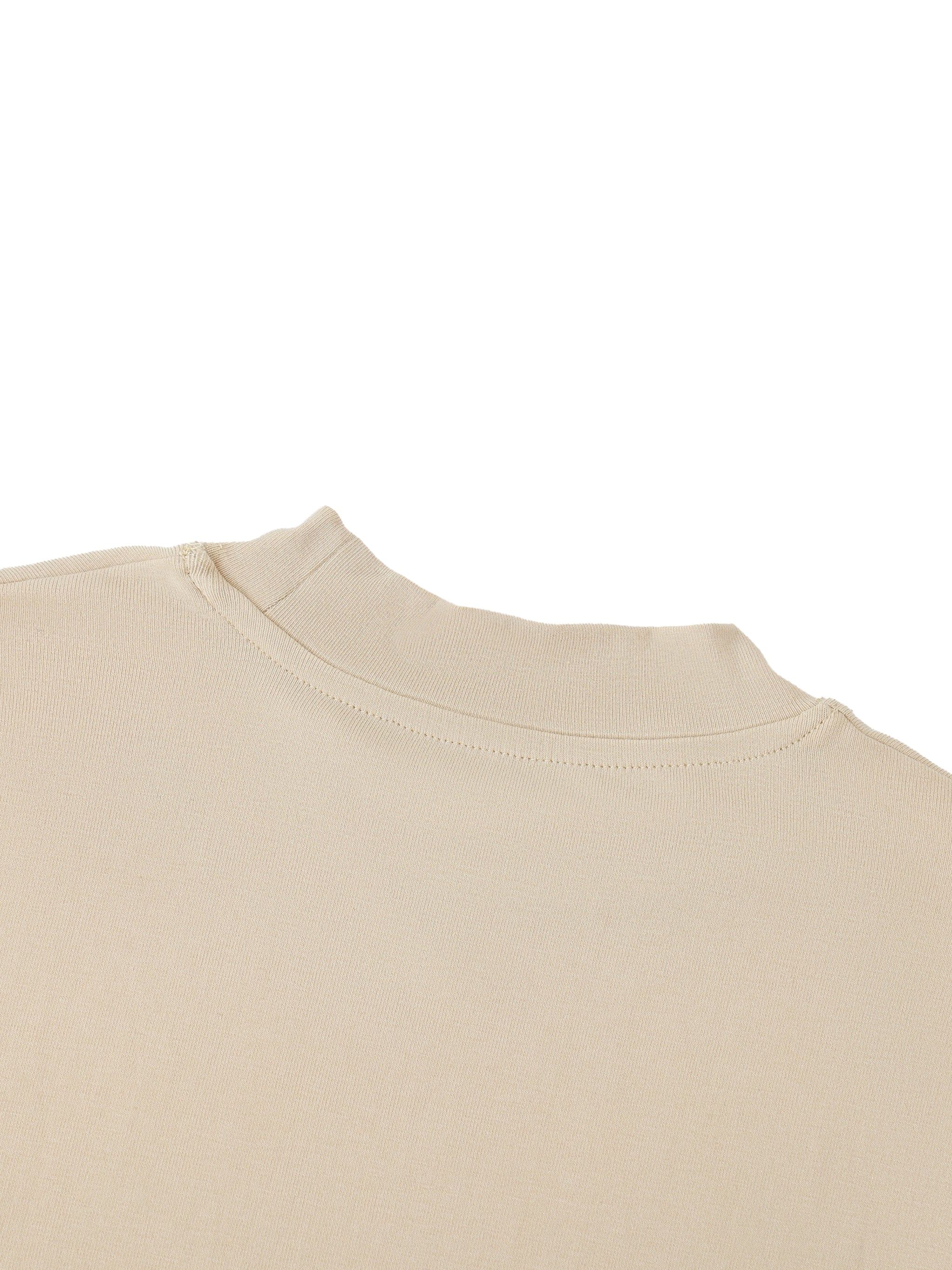 ODMPOD essential mock neck long sleeve T-shirt in white, close-up of fabric and neckline detail
