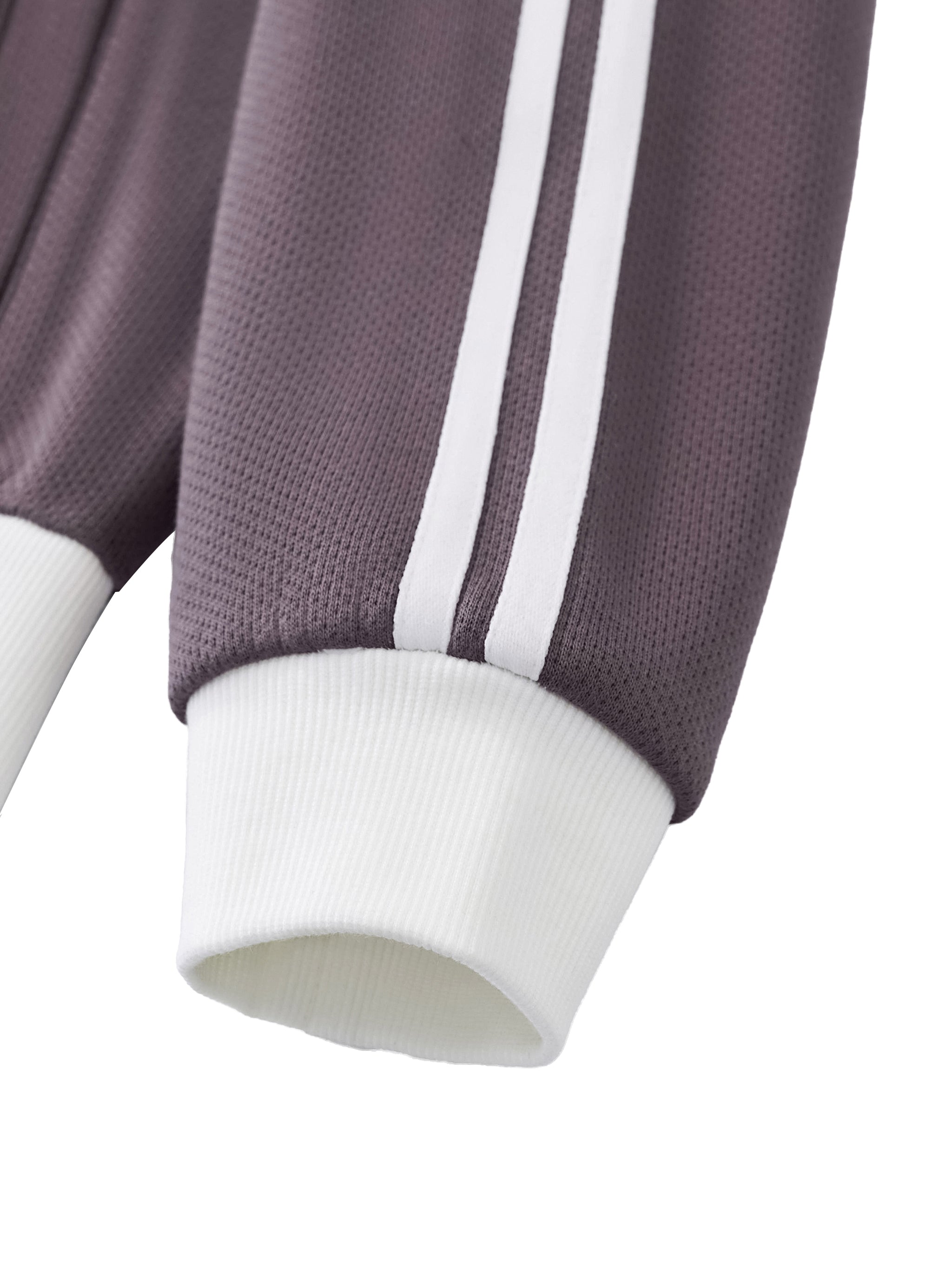 ODMPOD side stripe fleece cropped track jacket shown in black with white side stripes and a relaxed fit.