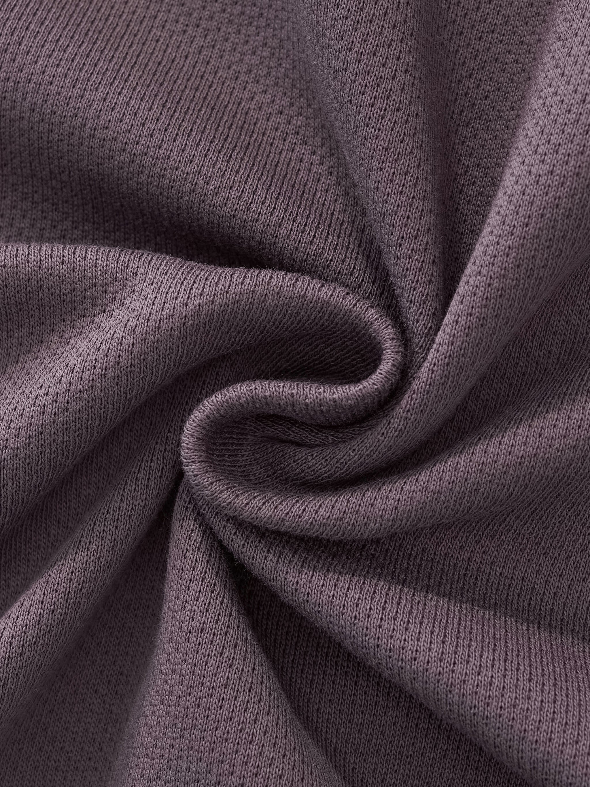 ODMPOD side stripe fleece cropped track jacket with front zipper and sporty design, shown on a hanger.